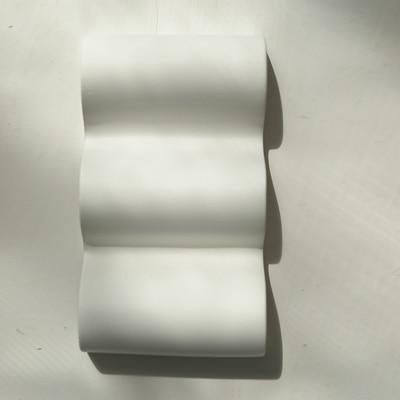 Wavy concrete soap holder